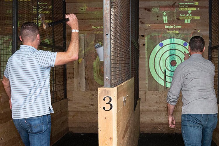 Ax throwing as team-building exercise at Full Throttle Adrenaline Park, Florence.