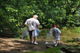 Northern Kentuckians participate in a Licking River cleanup day.