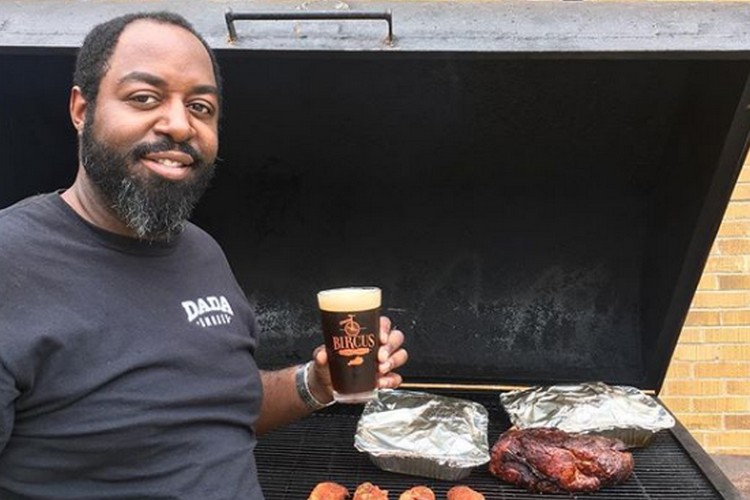 Kevin Peterson of Dada Smokes, cooking outside of Bircus Brewery last summer.