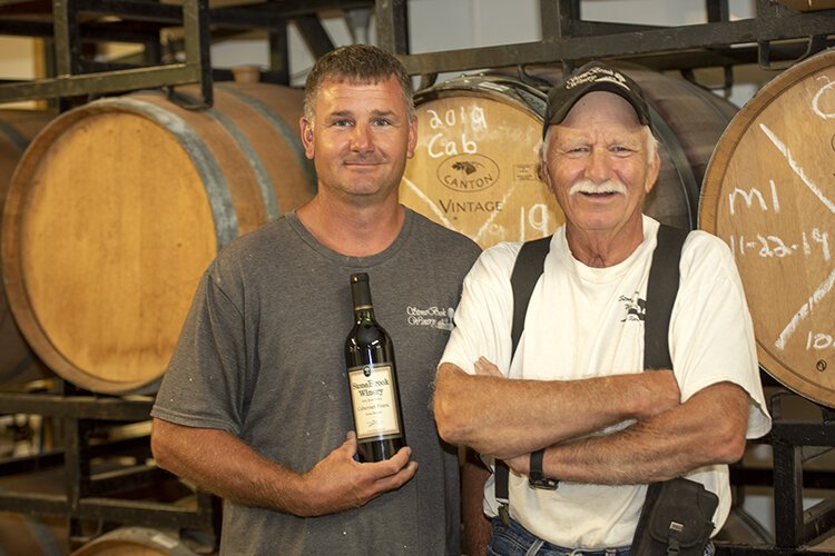 Brian and Dennis Walter in the production room at their StoneBrook Winery.