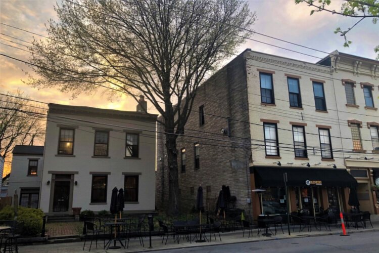 Former Gov. John Stevenson's home, left, will become a wine bar and restaurant.