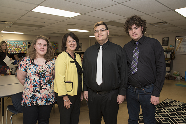 Academy scholars (from left) Sydney Wilson, Wayne Porter and Holden Robbins pose with Kenton County Superintendent of Schools Dr. Terri Cox-Cruey