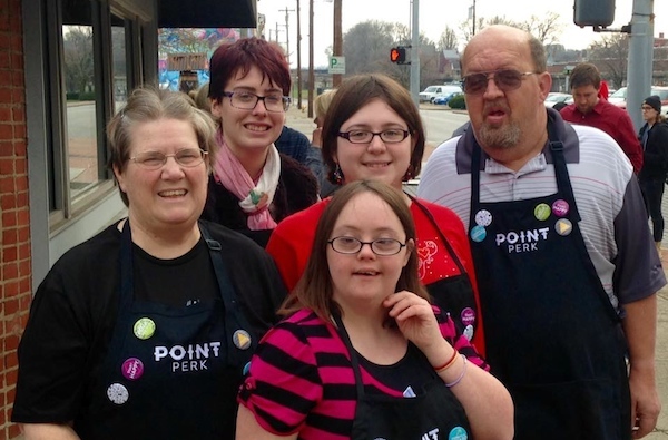 Point Perk employees celebrate its grand opening in December