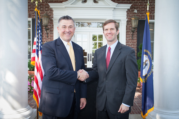 Attorney General Andy Bashear (right) visited CHNK in May to present CEO Rick Wurth with $450K investment award