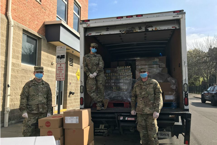 The Kentucky National Guard sent members to help food banks around the region, including the Brighton Center.