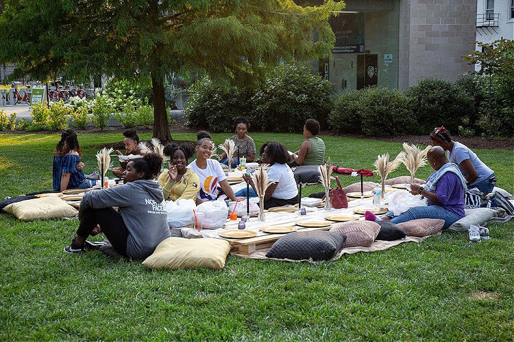 Part of Cradle Cincinnati's Queens Village program, a picnic in Washington Park.