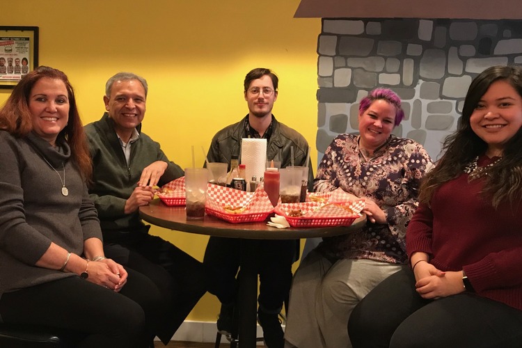 Gathered staff include, from left, Executive Director Irene Encarnacion, Board Chair Leo Calderon, NKU intern Jack Maslovar, Resource Manager Cyndy Rodewald and NKU intern Brenda Moran.