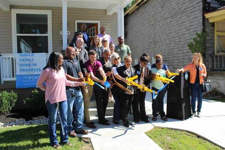 The ribbon cutting at the Evanston-Jonathan House