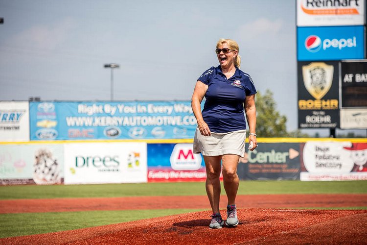 Florence Freedom owner and assistant general manager of operations Kim Brown throws out the first pitch before a game.