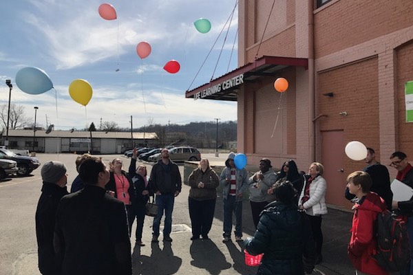 LLC grads celebrate following February's commencement ceremony.