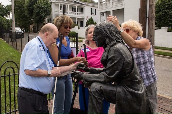 Visually impaired residents take part in a nano-grant funded art walk.