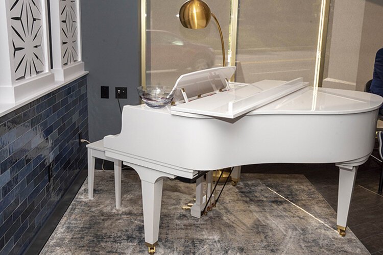 The white grand piano