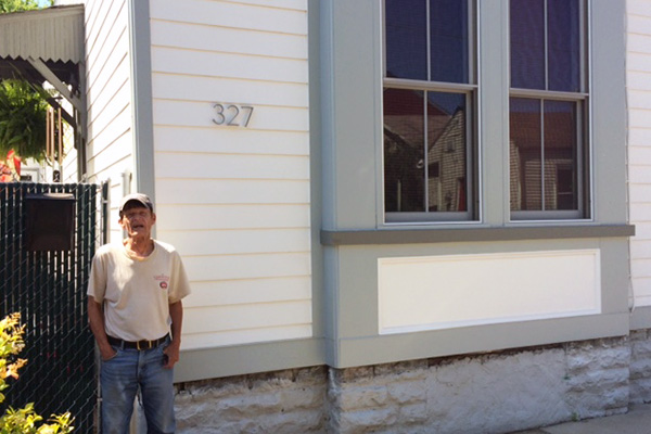 The interior of Huss' home was left intact; exterior now matches its Shotgun Row neighbors.