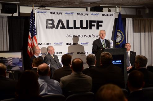 Gov. Beshear at a ribbon cutting at Balluff in 2013