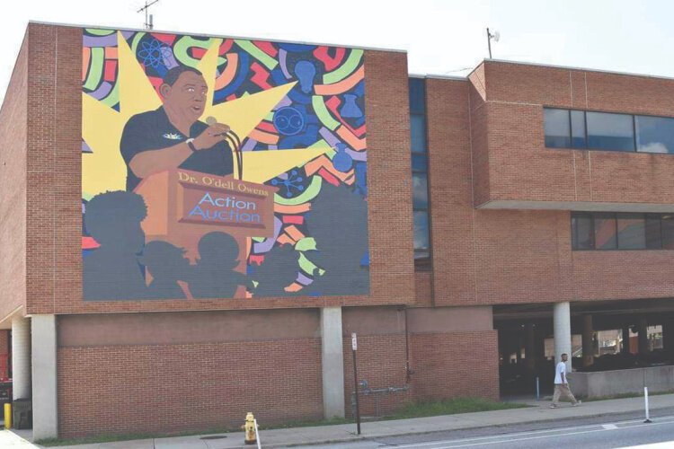 A mural was painted on the side of CET's building in honor of Dr. O'dell Owens.